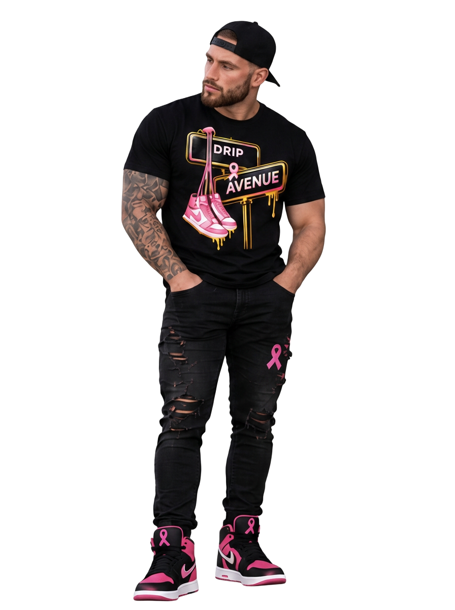 Full-body male model wearing a black Drip Avenue sneaker graphic shirt, black distressed jeans, and black and pink sneakers